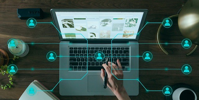 Someone types on a computer. Profile icons are superimposed over the photograph. 